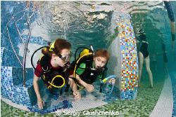 Children diving by Sergiy Glushchenko 